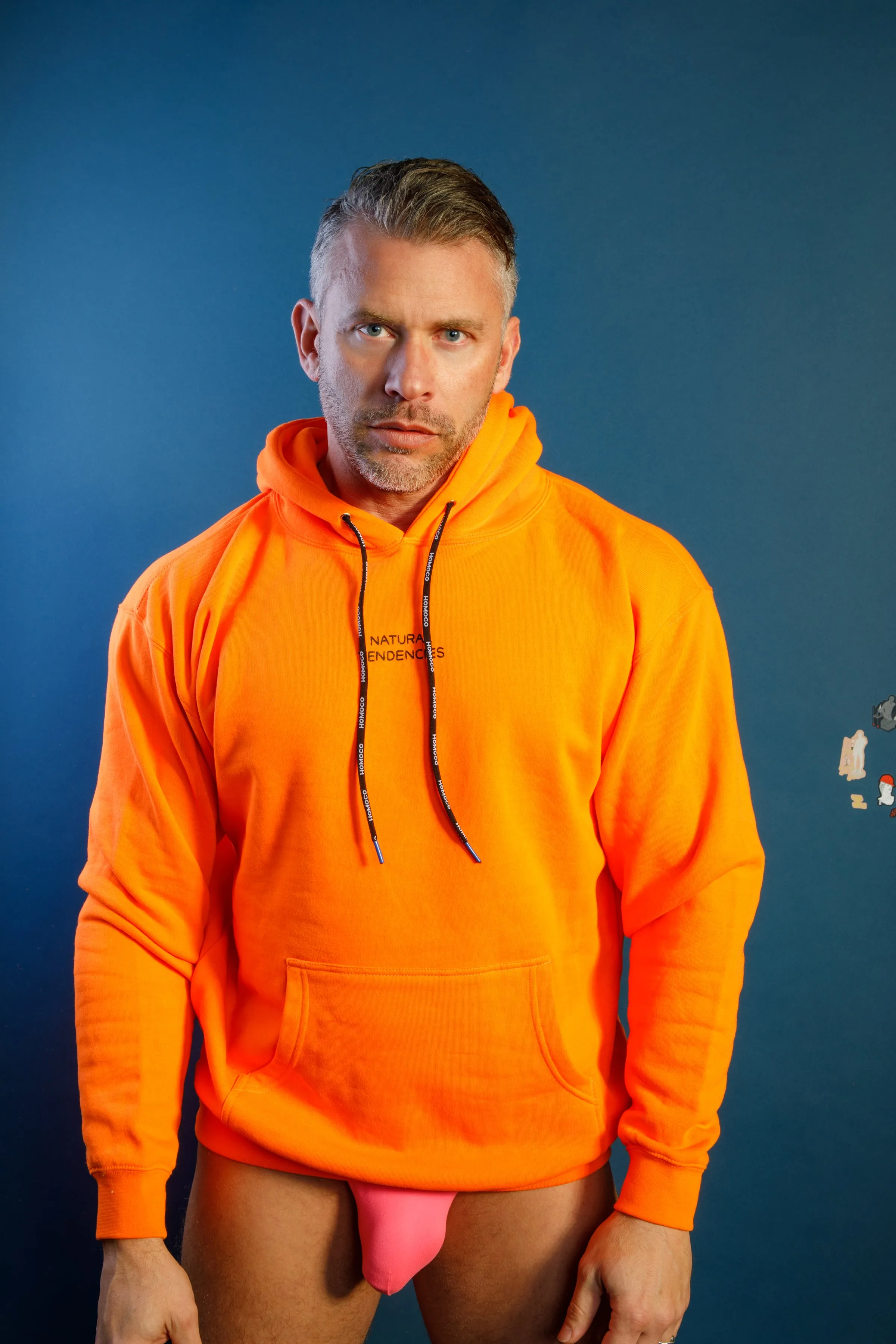 Tom of Finland Safety Orange Lover of Many Hoodie By HOMOCO